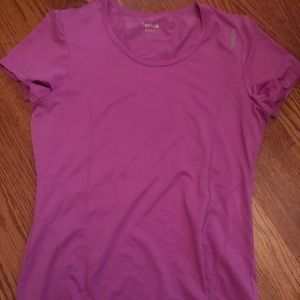 Reebok women’s athletic shirt.